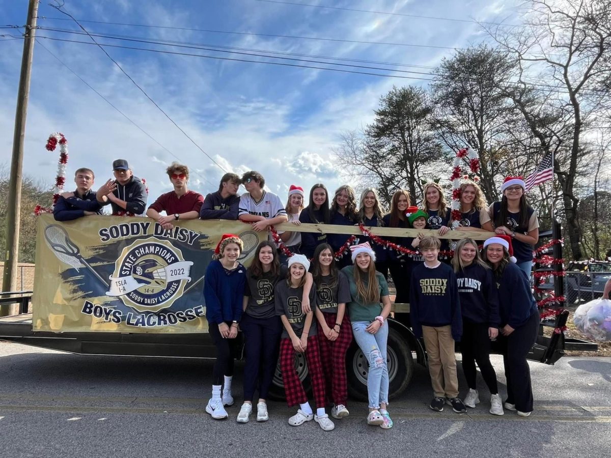 The Soddy Daisy High School Lacrosse Team and their float