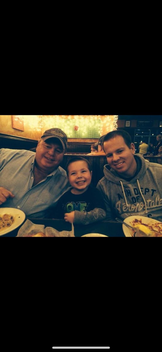 Photo of younger Noah, his grandfather, and father.